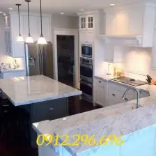 Đá ốp bếp và bàn ăn trắng hy lạp nhiều vân